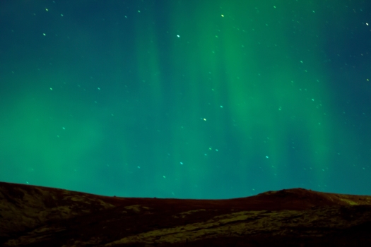 Green Aurora Borealis in the night sky