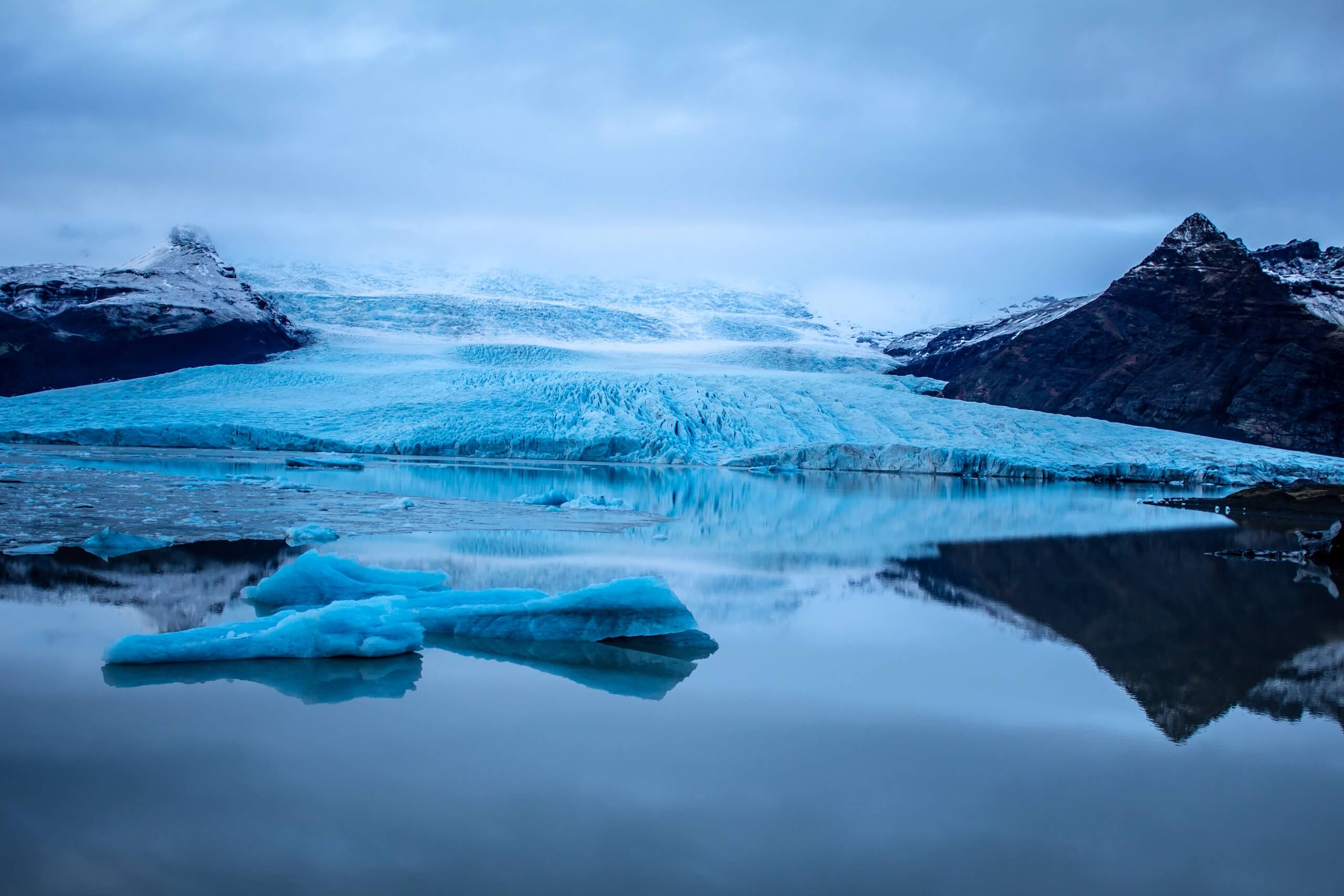 A glacier reflected in a lagoon